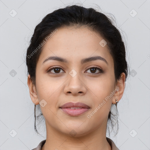 Joyful latino young-adult female with short  brown hair and brown eyes