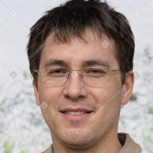 Joyful white adult male with short  brown hair and grey eyes