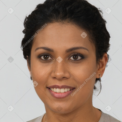 Joyful latino young-adult female with short  brown hair and brown eyes