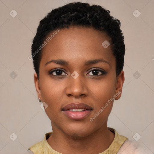 Joyful black young-adult female with short  black hair and brown eyes