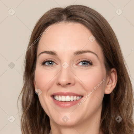 Joyful white young-adult female with medium  brown hair and green eyes