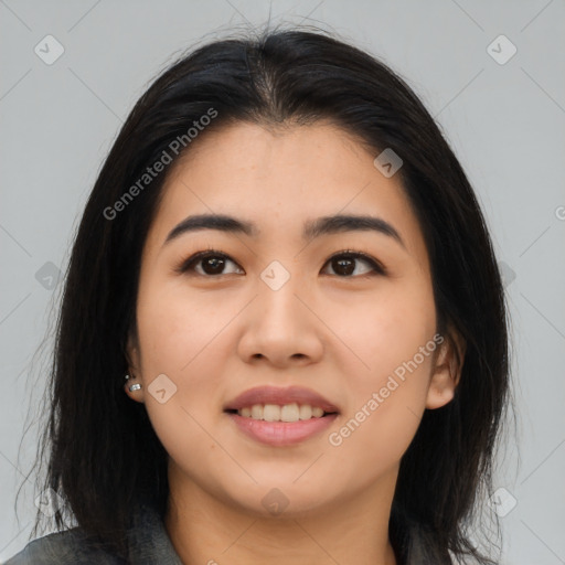 Joyful asian young-adult female with long  brown hair and brown eyes