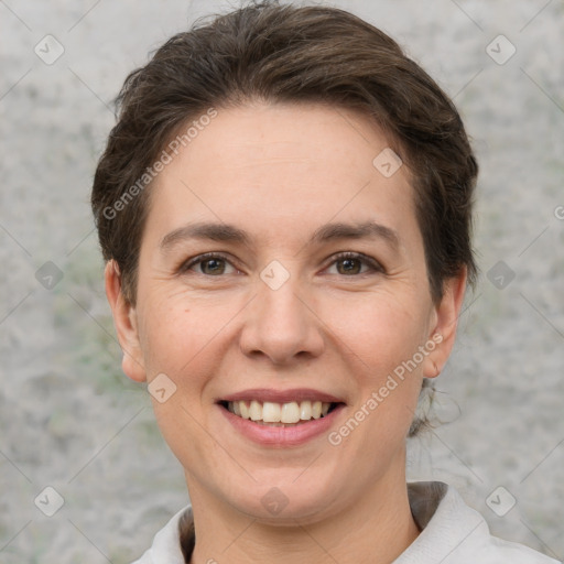 Joyful white adult female with short  brown hair and brown eyes