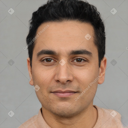 Joyful latino young-adult male with short  black hair and brown eyes