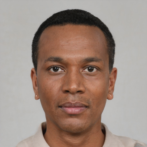 Neutral black young-adult male with short  black hair and brown eyes