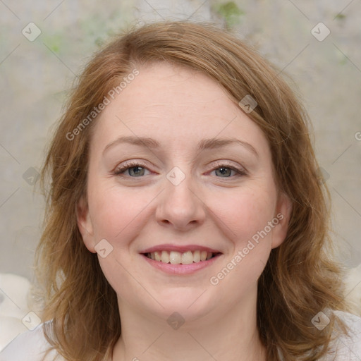 Joyful white young-adult female with medium  brown hair and blue eyes