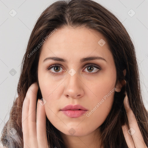 Neutral white young-adult female with long  brown hair and brown eyes