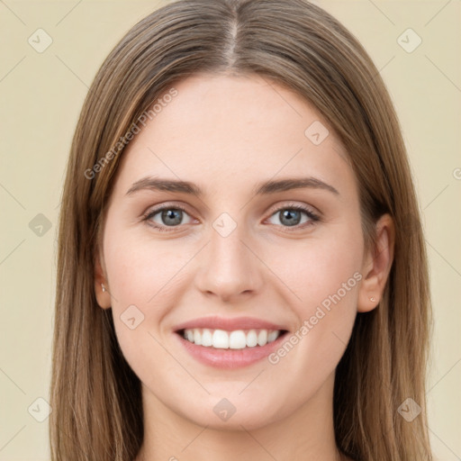 Joyful white young-adult female with long  brown hair and green eyes