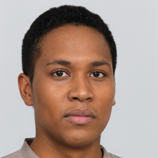 Neutral black young-adult male with short  black hair and brown eyes