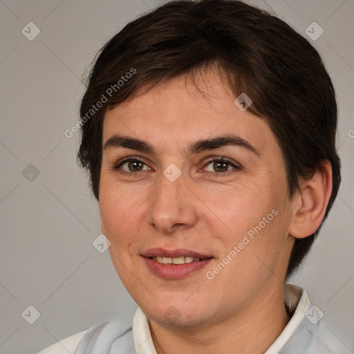 Joyful white adult female with medium  brown hair and brown eyes