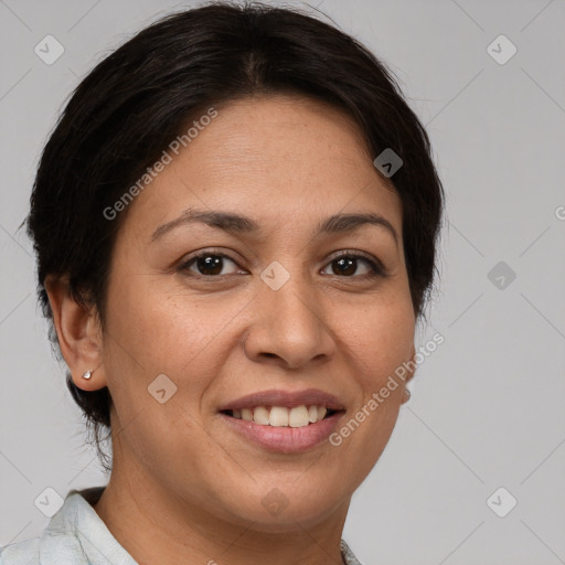 Joyful white adult female with short  brown hair and brown eyes