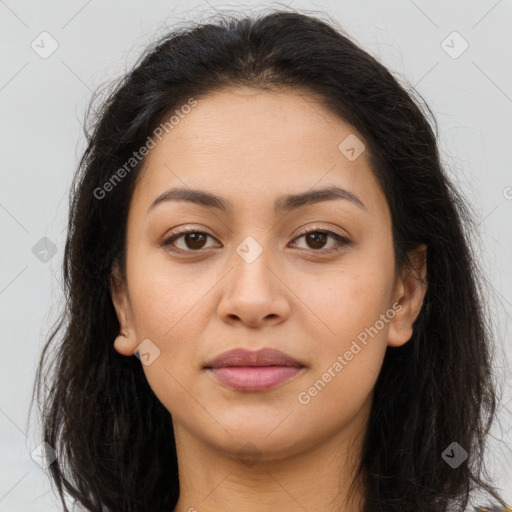 Joyful latino young-adult female with long  brown hair and brown eyes