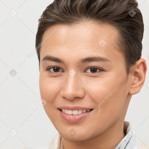 Joyful white young-adult female with short  brown hair and brown eyes