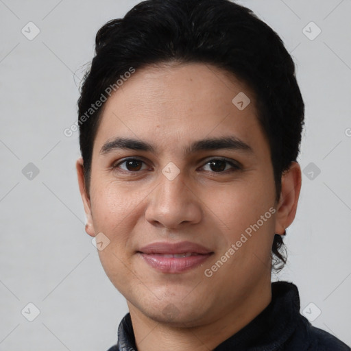 Joyful white young-adult male with short  black hair and brown eyes