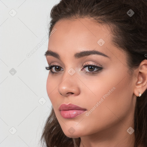 Neutral white young-adult female with long  brown hair and brown eyes