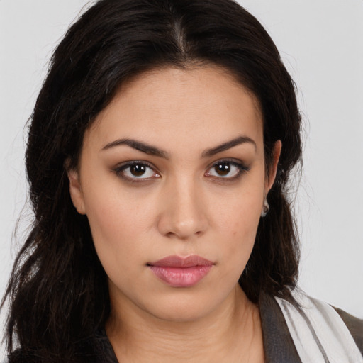 Neutral white young-adult female with long  brown hair and brown eyes