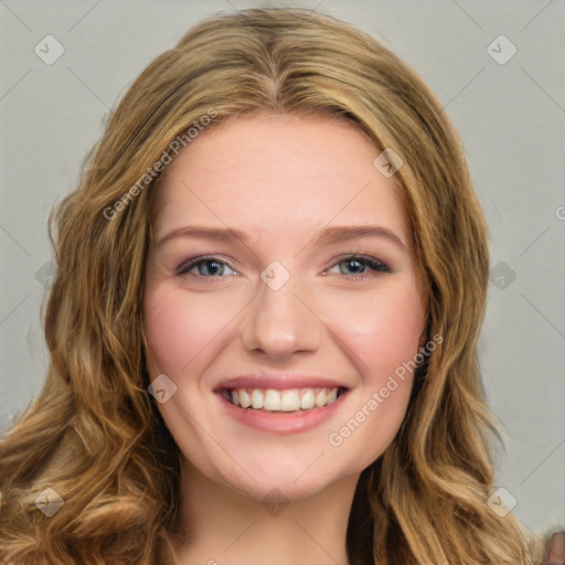 Joyful white young-adult female with long  brown hair and blue eyes