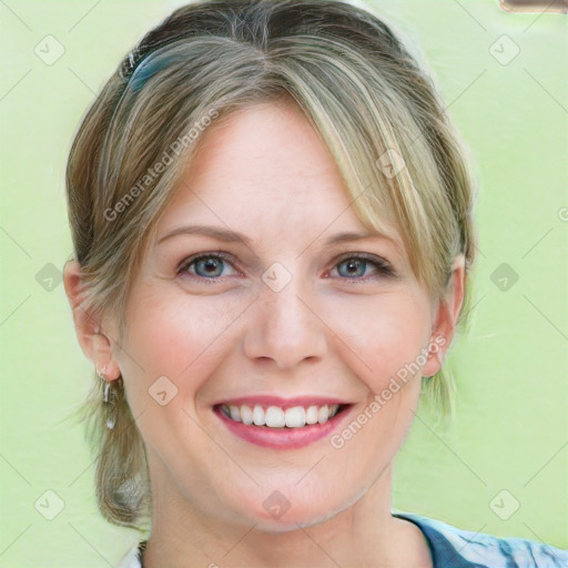 Joyful white young-adult female with medium  brown hair and blue eyes