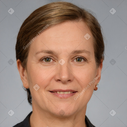 Joyful white adult female with medium  brown hair and grey eyes