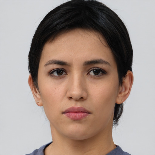 Neutral latino young-adult female with short  black hair and brown eyes