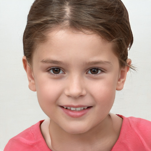 Joyful white child female with short  brown hair and brown eyes