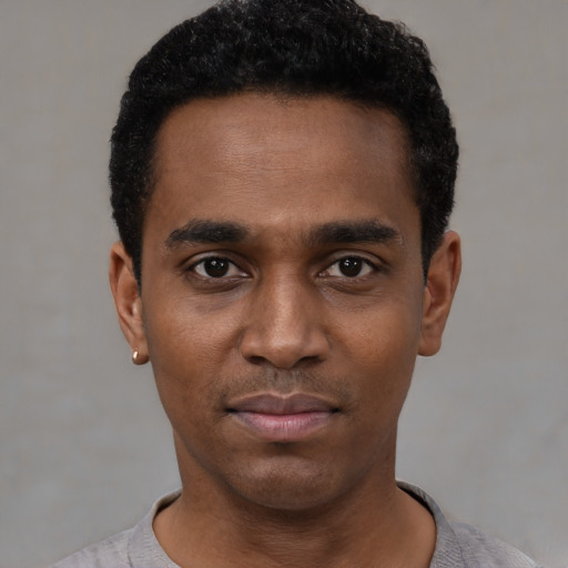 Neutral black young-adult male with short  black hair and brown eyes