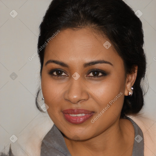 Joyful latino young-adult female with medium  brown hair and brown eyes