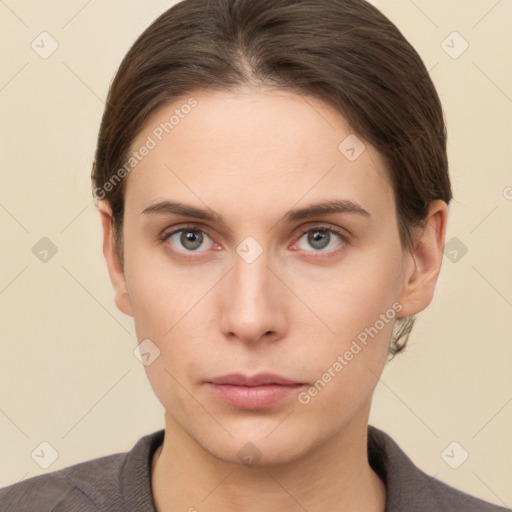 Neutral white young-adult female with short  brown hair and brown eyes