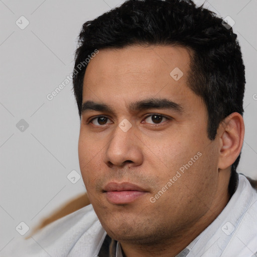 Neutral white young-adult male with short  black hair and brown eyes