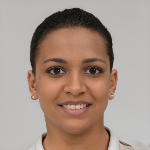 Joyful latino young-adult female with short  brown hair and brown eyes