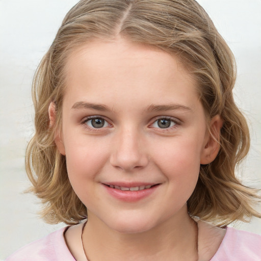 Joyful white child female with medium  brown hair and grey eyes