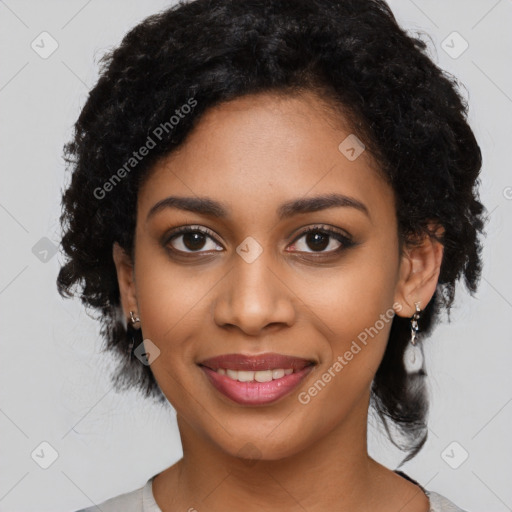 Joyful black young-adult female with medium  black hair and brown eyes