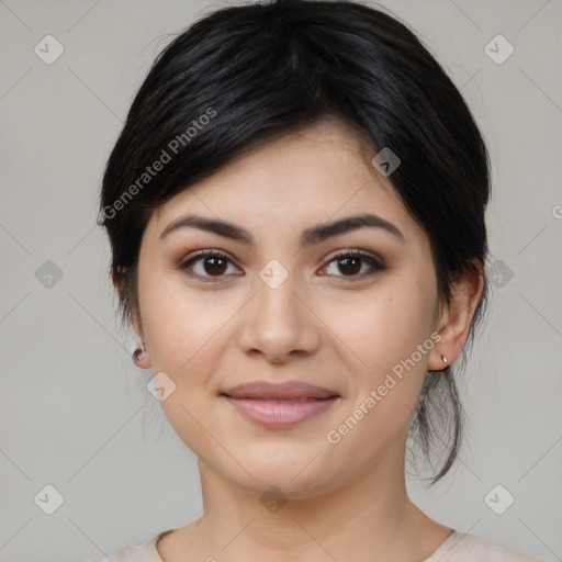 Joyful asian young-adult female with medium  black hair and brown eyes