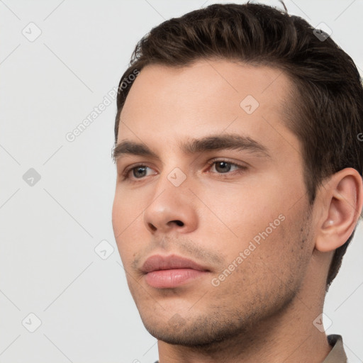 Neutral white young-adult male with short  brown hair and brown eyes