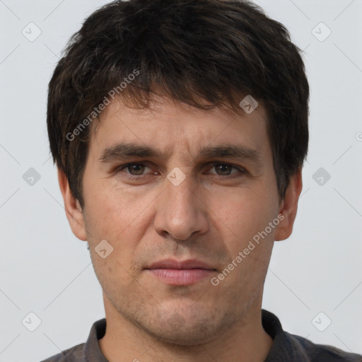 Neutral white adult male with short  brown hair and brown eyes