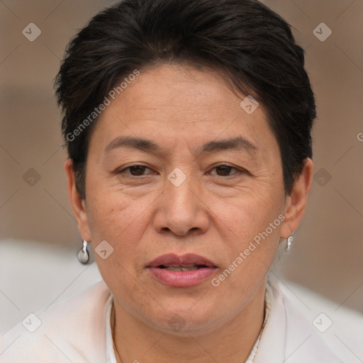 Joyful white adult female with short  brown hair and brown eyes