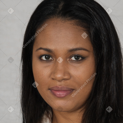 Joyful black young-adult female with long  brown hair and brown eyes