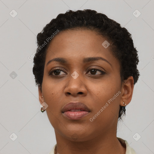 Neutral black young-adult female with short  brown hair and brown eyes