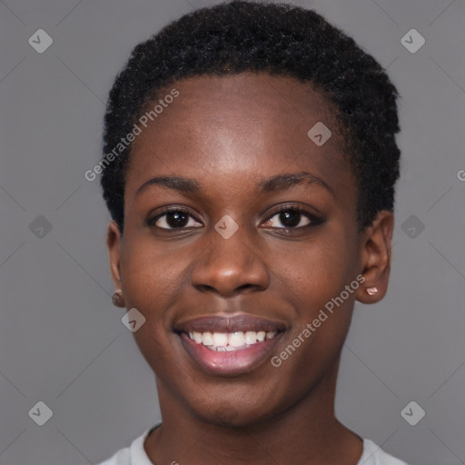 Joyful black young-adult female with short  black hair and brown eyes