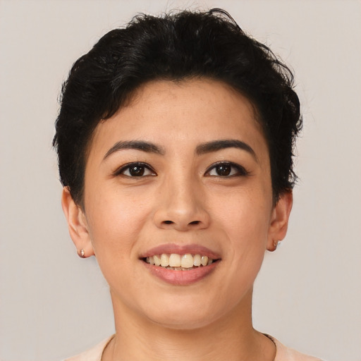 Joyful asian young-adult female with short  brown hair and brown eyes