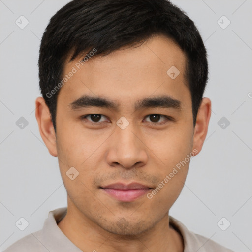 Joyful asian young-adult male with short  black hair and brown eyes