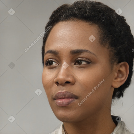 Neutral black young-adult female with short  black hair and brown eyes