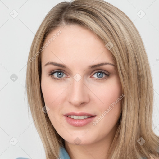 Joyful white young-adult female with long  brown hair and blue eyes