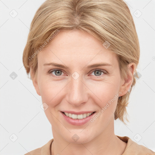 Joyful white young-adult female with medium  brown hair and blue eyes