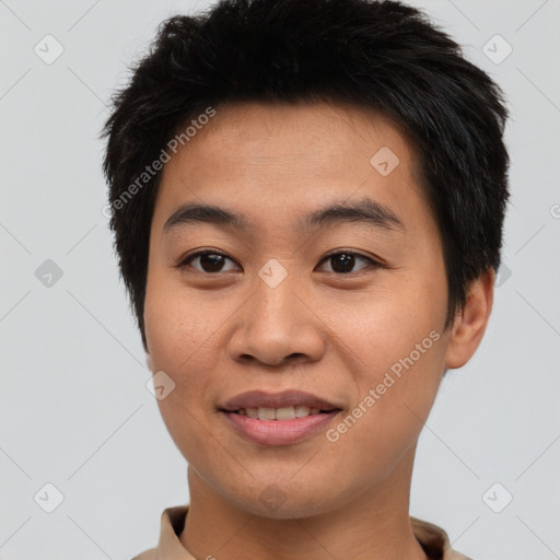 Joyful asian young-adult male with short  black hair and brown eyes