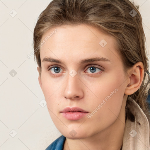 Neutral white young-adult female with long  brown hair and grey eyes