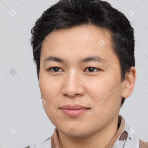 Joyful asian young-adult male with short  brown hair and brown eyes