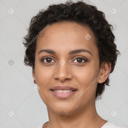 Joyful latino young-adult female with short  brown hair and brown eyes