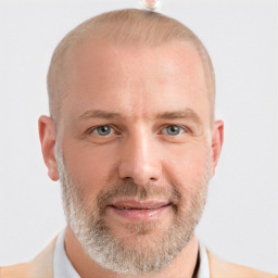 Joyful white adult male with short  brown hair and grey eyes