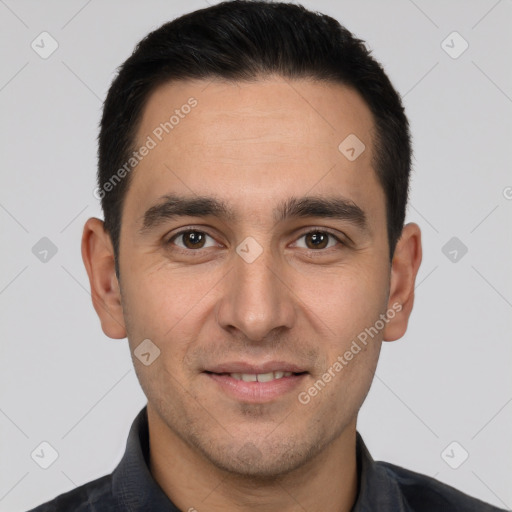 Joyful white young-adult male with short  brown hair and brown eyes